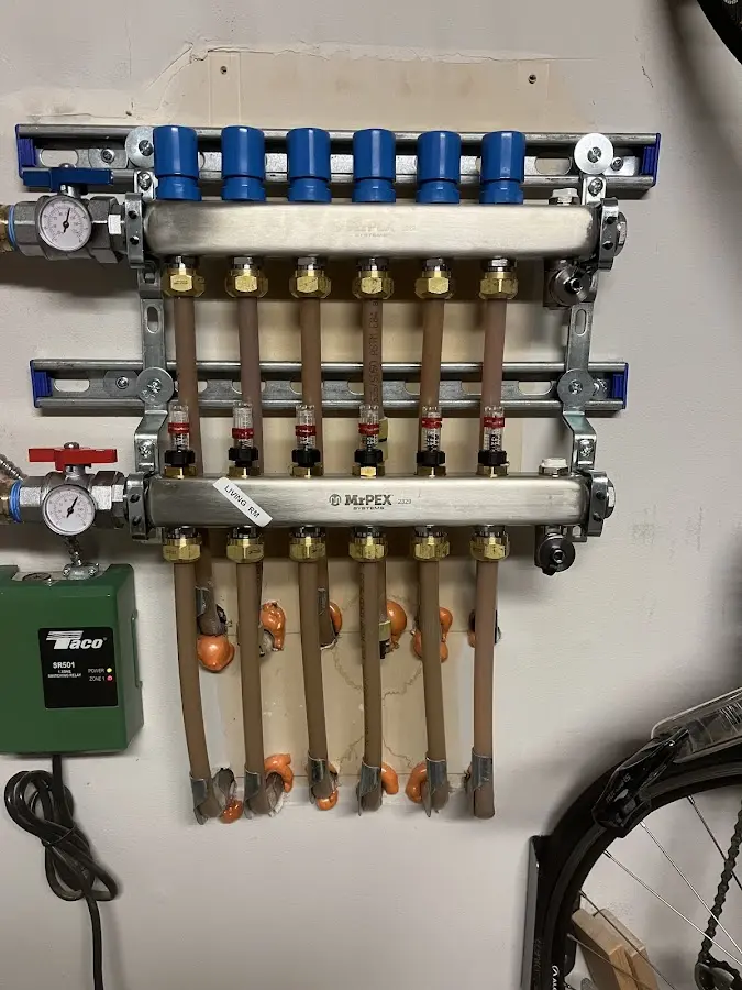 Plumber performing Water Heater Repair at a residential property in Poulsbo